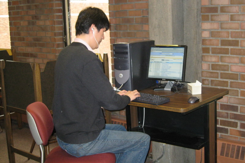 A blind screen reader user accesses his web-based email using WebAnywhere from a library computer with no traditional screen reader installed on it.